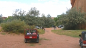 PICTURES/Canyon de Chelly - Jeep Tour/t_Petroglyphs9-Tourists.JPG